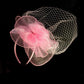 Fascinator cerchietto rosa veletta